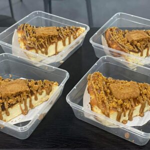 Biscoff cheesecake slice with creamy filling and biscuit topping Title